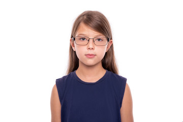 Obraz premium Portrait of a little girl with glasses isolated on a white backgroud.