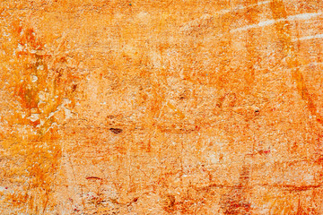 Texture of a concrete wall with cracks and scratches which can be used as a background