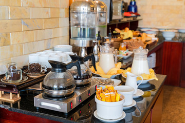 Self service breakfast at drink counter in a hotel restaurant