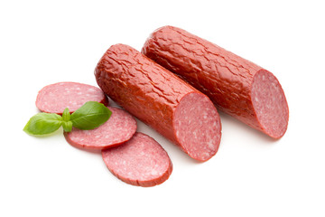Salami smoked sausage, basil leaves on white background cutout.