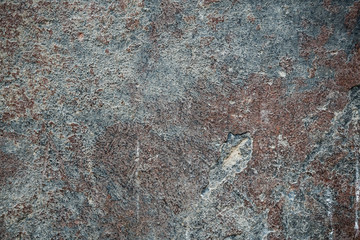 Texture of an old wall covered with paint. Background image of a worn paint coated surface