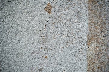 Texture of an old wall covered with paint. Background image of a worn paint coated surface