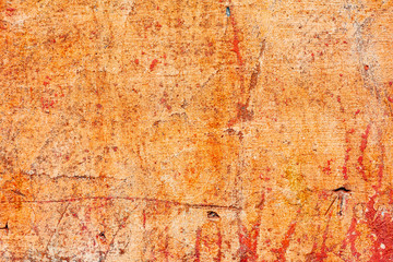 Texture of a concrete wall with cracks and scratches which can be used as a background