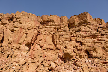 Coloured Canyon is a rock formation on South Sinai (Egypt) peninsula. Desert rocks of multicolored sandstone background.	