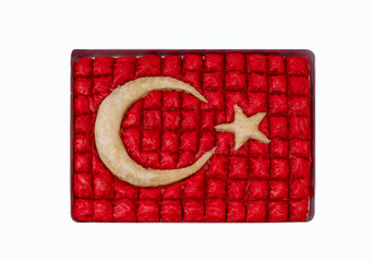 Turkish baklava shaped as Turkish flag in a market, the star and crescent