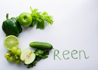 G means Green! The letter G is lined with green vegetables and fruits: cucumber, green onions, bell peppers, cilantro, celery, apples, grapes and lime, Then it is written in green continuation of the
