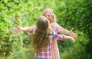 Happy reunion concept. Best friends forever. Happy kids running meet each other. Sincere emotions....