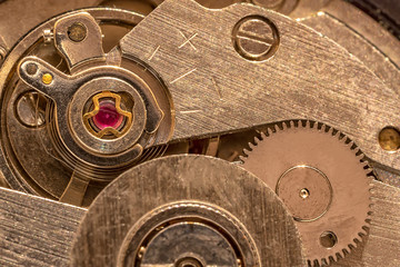 Macro shot of clockwork gears inside the watch