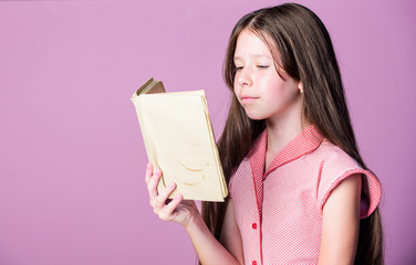 Thirst of knowledge. Adorable bookworm. Reading literature as hobby. Little girl learn reading....