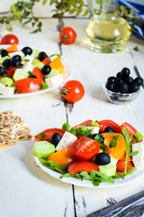 greek salad with fresh tomatoes, cucumber and olives