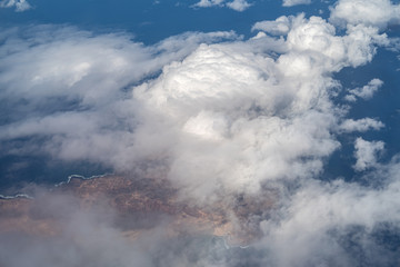 Clearing in clouds showing the Lanzarote volcanic island in the Canary Islands, Spain © Dmytro Surkov