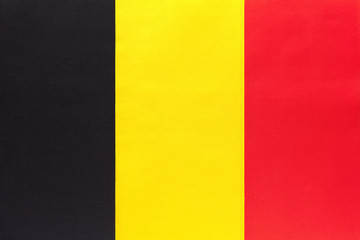 Fototapeta premium Kingdom Belgium national fabric flag, textile background. Symbol of international world country.
