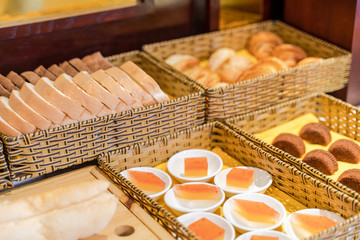 Assortment of fresh pastry on table in buffet