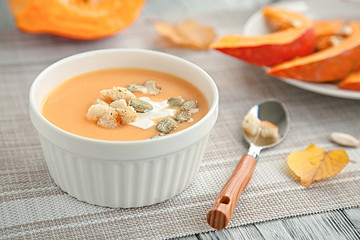 pumpkin cream soup in a white plate