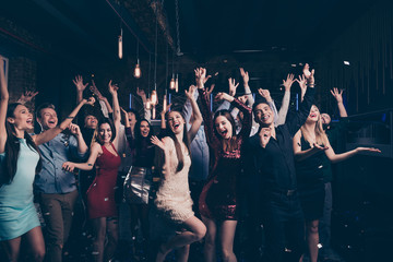 Portrait of cute millennial buddies fellows raise hands scream shout beautiful feel rejoice content...