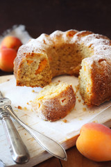 Homemade apricot bundt cake and fresh apricots
