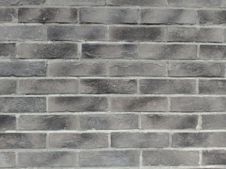 Gray brick wall. Construction material texture.
