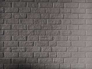 The brick wall has just been finished with cement. Construction material texture.