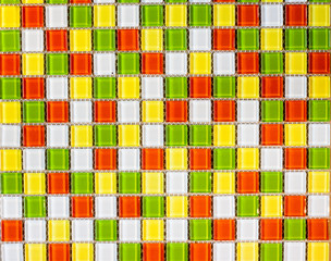 Warm-colored multi color tiles. Construction material texture.