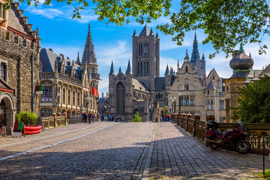 Medieval city of Gent (Ghent) in Flanders with Saint Nicholas Church and Gent Town Hall, Belgium. Cityscape of Ghent.