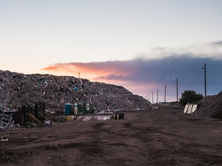 Early morning at a recycling dump