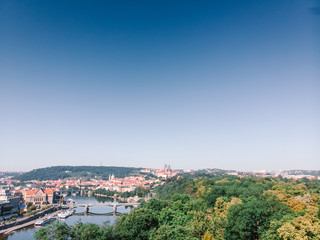 Fototapeta na wymiar Scenic summer sunrise aerial view of the Old Town pier architecture and Charles Bridge over Vltava river in Prague, Czech Republic, travel tour to Europe concept design. copy space
