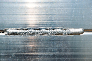 Extreme macro shot of welded aluminum composite material