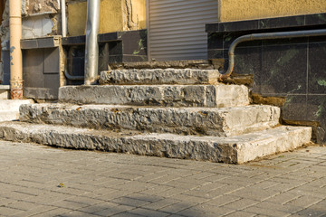 Old ruined concrete stairs before renovation works.