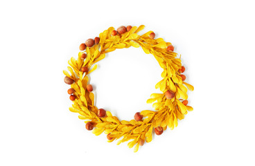 Floral wreath made of beautiful yellow leaves.