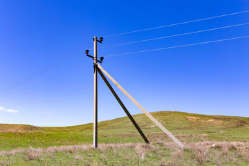 Fototapeta na wymiar Electric post in the mountains