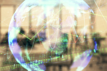 Fototapeta na wymiar Stock and bond market graph and world map with trading desk bank office interior on background. Multi exposure. Concept of international finance
