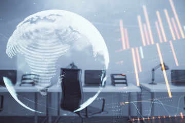 Stock and bond market graph and world map with trading desk bank office interior on background. Multi exposure. Concept of international finance