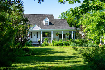 Fototapeta na wymiar Landscaped Lawn and House
