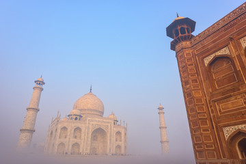 Taj Mahal in the fog at Indian city of Agra, Uttar Pradesh, India.