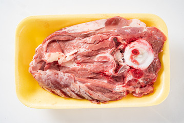 veal meat on the white