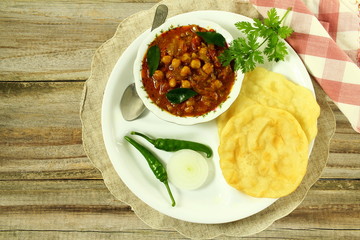 traditional indian punjabi food chole bhature or chole kulcha spicy chick pea curry 