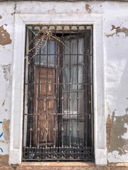old window in stone wall