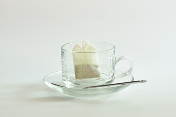 Tea and  Green Tea bag in glass cup is ready to drink