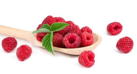.raspberries in a spoon on a white background