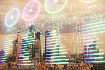 Double exposure of business drawing hologram on cityscape background.