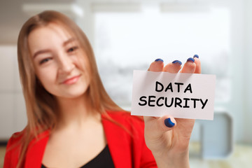 Business, technology, internet and networking concept. Young entrepreneur showing keyword: Data...