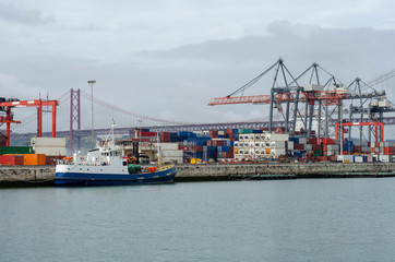 Container ship port of Lisbon on a Tagus river