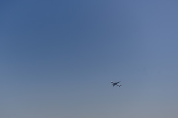 plane on the blue sky