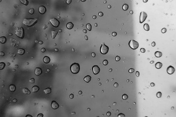 Raindrops on the glass.