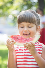 girl eating watermelon