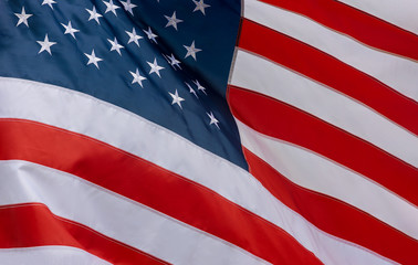 Closeup of American flag waving in the wind