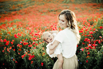 a woman having fun with her baby