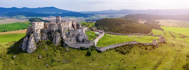 Aerial view of Spis (Spiš, Spišský) castle, Unesco Wold Heritage, Slovakia, second biggest medieval castle in Middle Europe. - obrazy, fototapety, plakaty