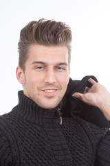 cool looking man in black sweater