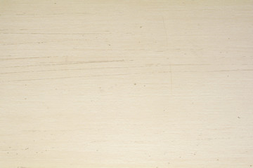 Scratched cream wood surface background. Wood grain pattern texture background in light cream beige color tone.